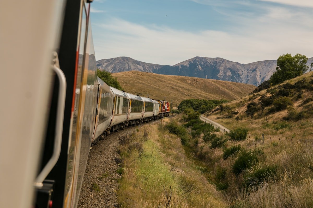 resfeber meaning — train traveling through mountain landscape, evoking pre-travel anticipation