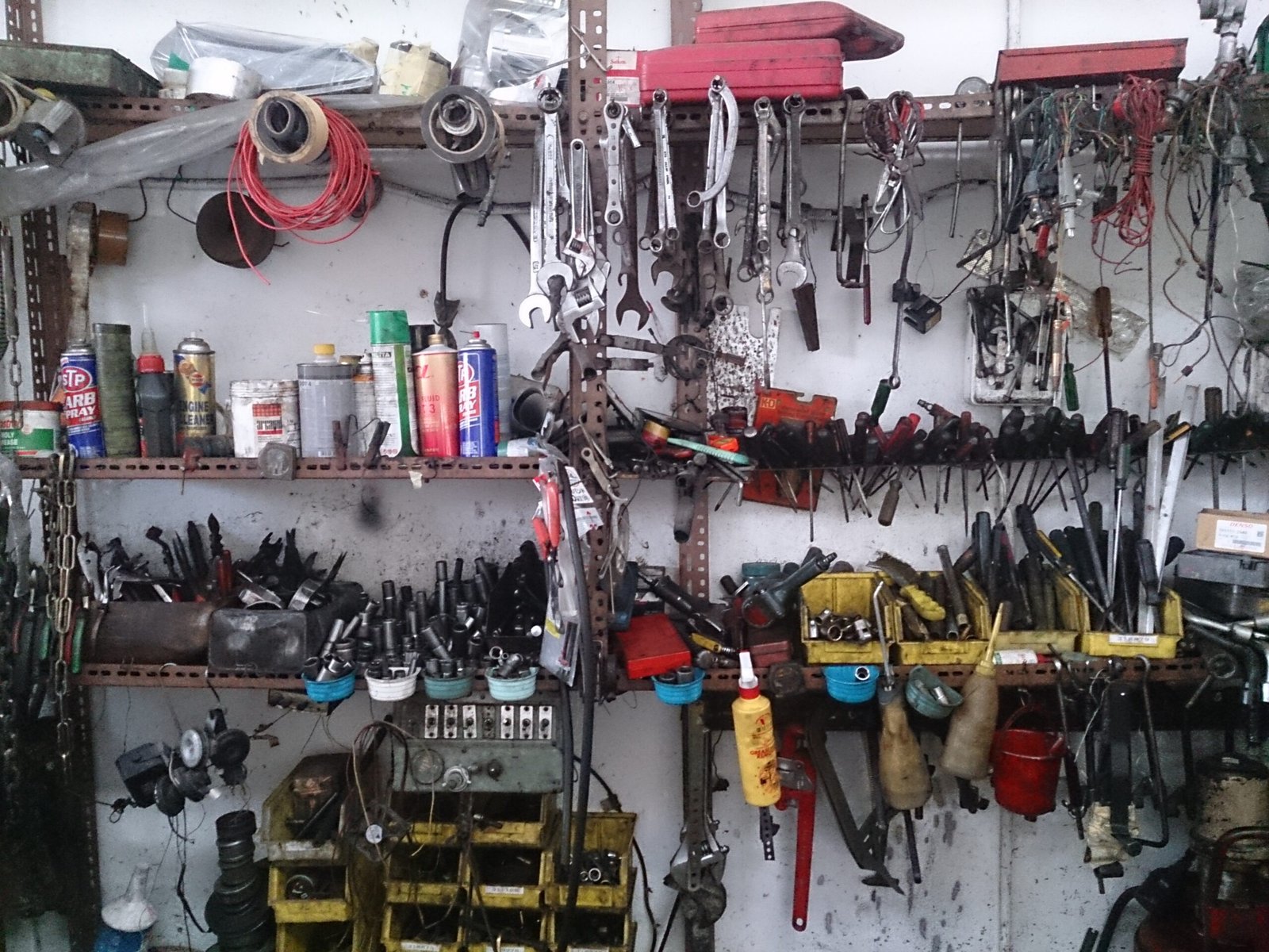 verschlimmbessern meaning — workshop tools representing the German concept of making things worse by trying to improve them